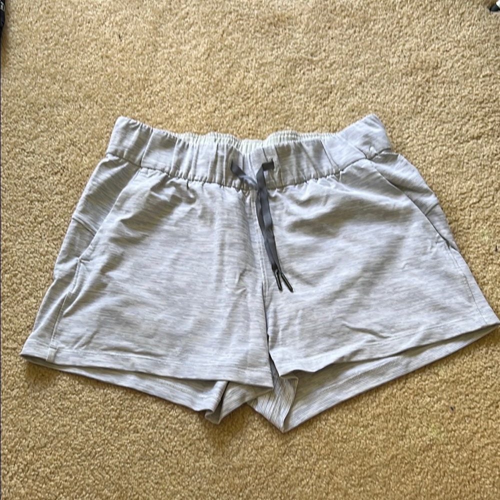 White & gray lululemon On The Fly shorts